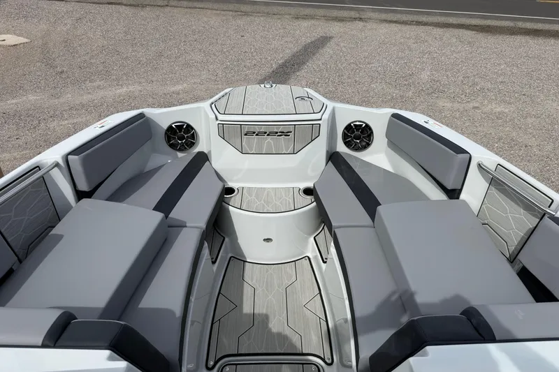 Slide: The Image of 2024 Yamaha Boats 222XD interior with gray seating and modern design. - 13