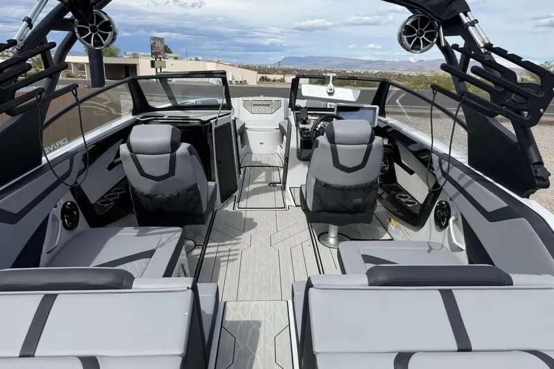 Slide: The Image of 2024 Yamaha Boats 222XD interior with modern seating and sleek design. - 8