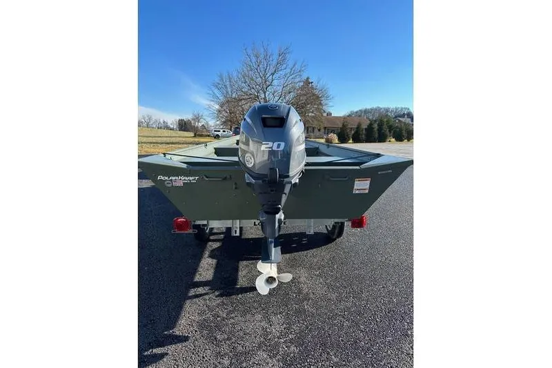 Slide: The Image of 2024 Polar Kraft 1448 Jon Boat with Yamaha 20 hp engine on trailer, rear view. - 6