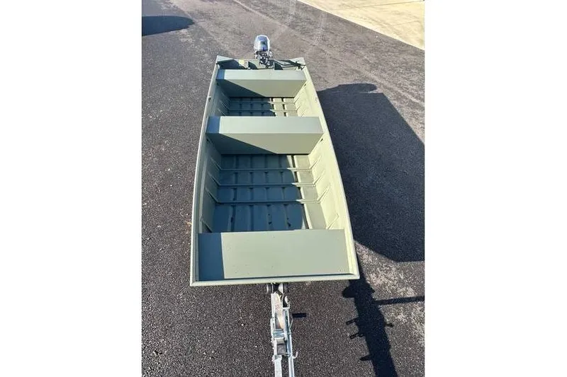 Slide: The Image of 2024 Polar Kraft 1448 Jon Boat with trailer and Yamaha 20 hp engine on asphalt. - 8
