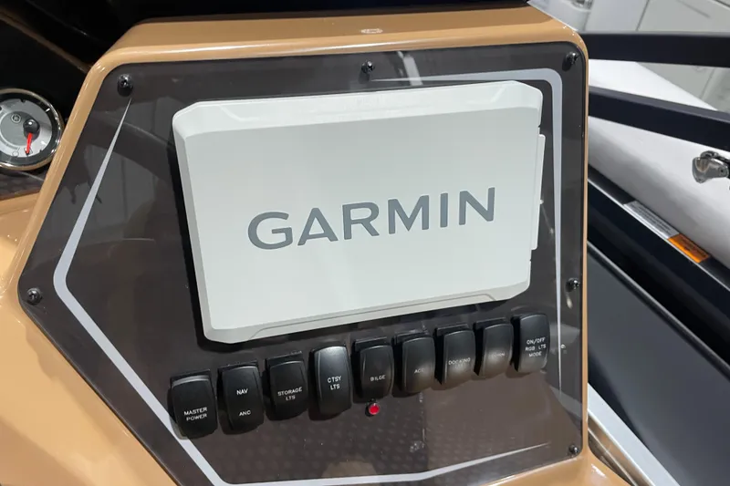 Slide: The Image of Garmin navigation system on 2025 SunCatcher Fusion 322RC boat dashboard. - 11