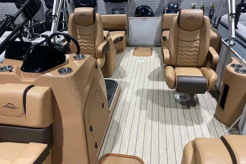 Slide: The Image of Luxurious interior of 2025 SunCatcher Fusion 322RC boat with plush seating and modern design. - 5