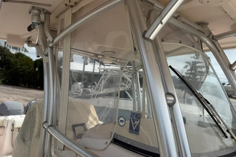 Slide: The Image of 2008 Grady-White Release 283 boat windshield and frame detail. - 8