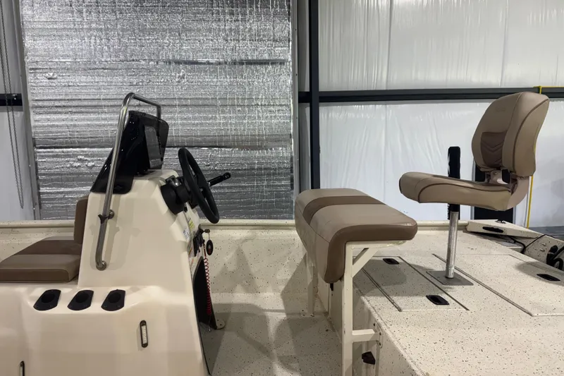 Slide: The Image of 2020 Xpress X18B boat interior with steering console and seating. - 4
