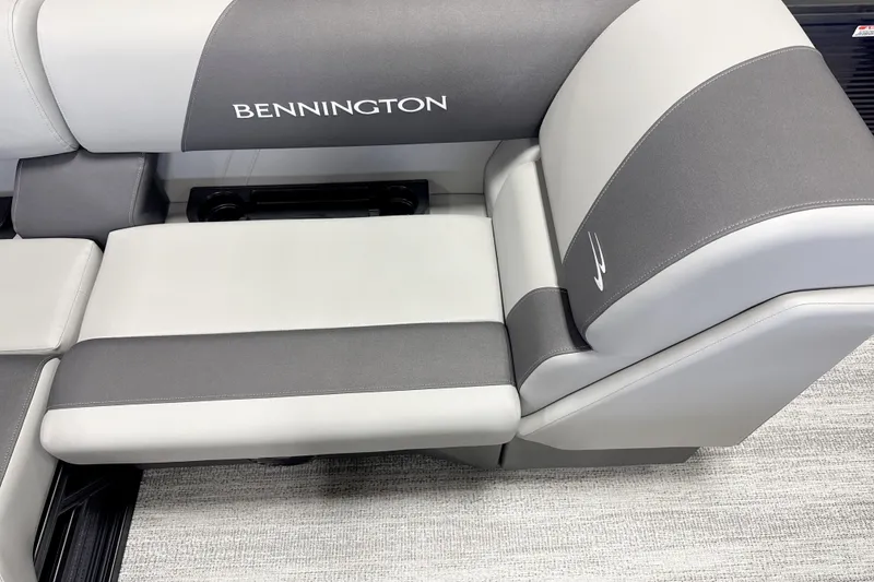 Slide: The Image of Luxurious seating on 2026 Bennington 22SSB boat, featuring sleek gray and white upholstery. - 4