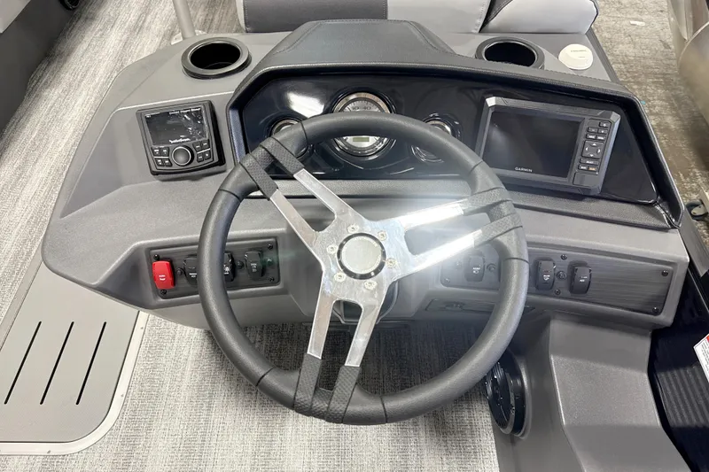 Slide: The Image of Steering console of 2026 Bennington 22SSB boat with modern controls and navigation system. - 7