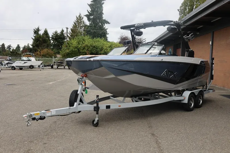 Slide: The Image of 2026 ATX Surf Boats 22 Type-S on trailer, parked outdoors. - 11