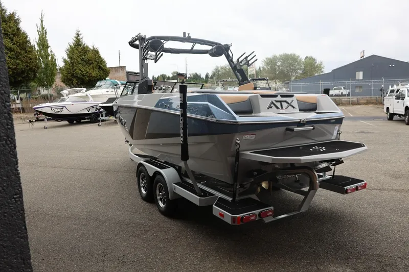 Slide: The Image of 2026 ATX Surf Boats 22 Type-S on trailer in parking lot. - 15