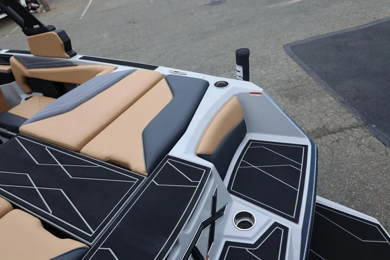 Slide: The Image of 2026 ATX Surf Boats 22 Type-S interior with tan and black seating, modern design. - 26