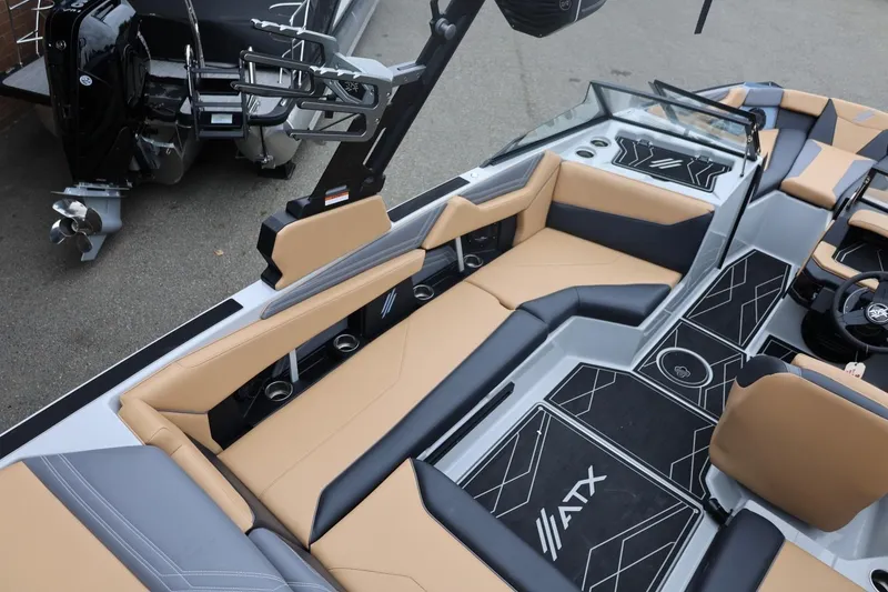 Slide: The Image of 2026 ATX Surf Boats 22 Type-S interior with tan and black seating, modern design, and spacious layout. - 30