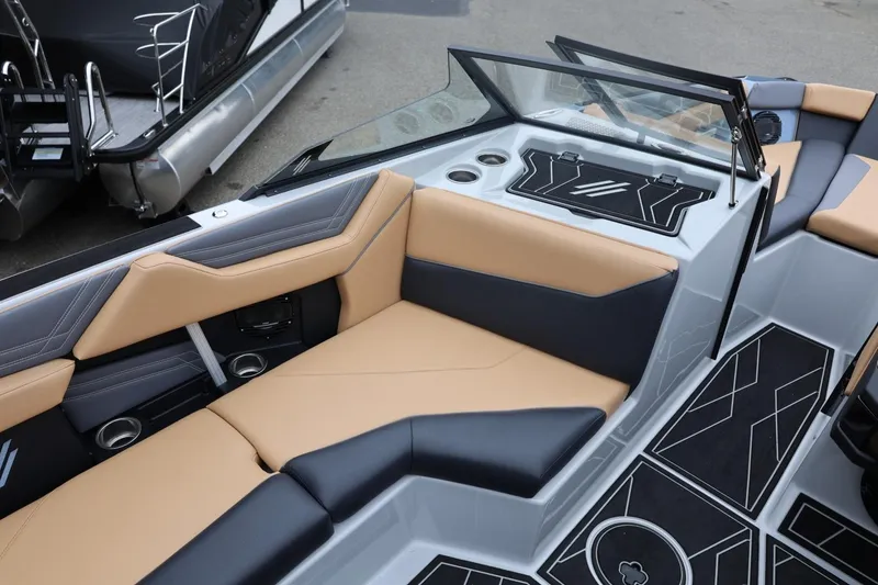 Slide: The Image of 2026 ATX Surf Boats 22 Type-S interior with tan and black seating, modern design. - 32