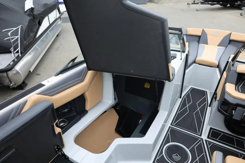 Slide: The Image of 2026 ATX Surf Boats 22 Type-S interior with open storage compartment and stylish seating. - 34