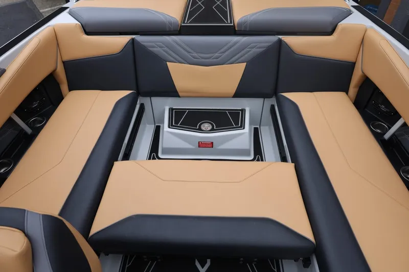 Slide: The Image of Luxurious interior of 2026 ATX Surf Boats 22 Type-S with tan and black seating. - 39