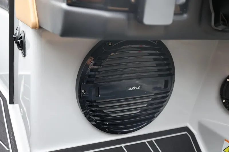 Slide: The Image of Close-up of Audison speaker on 2026 ATX Surf Boats 22 Type-S interior. - 51