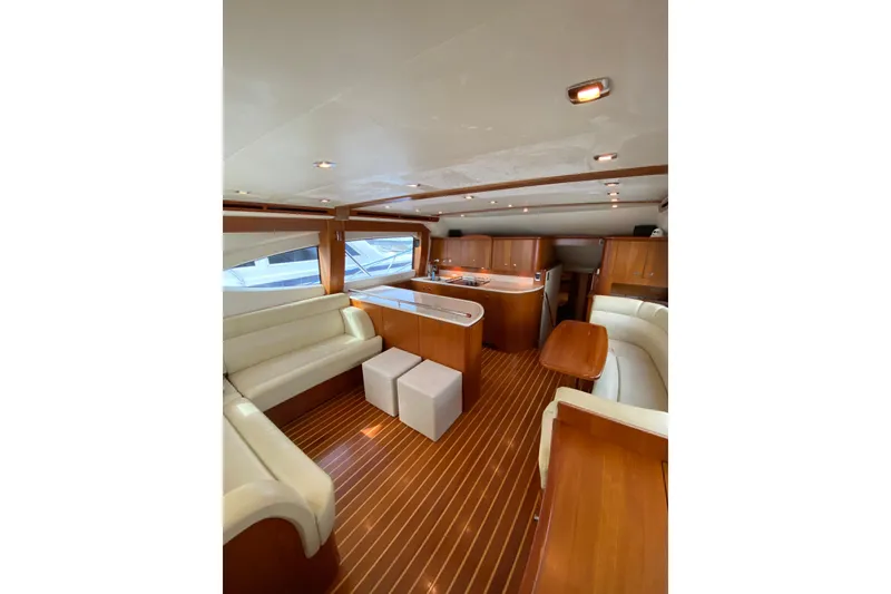 Slide: The Image of Luxurious interior of 2012 Tiara Yachts 4800 Convertible with elegant wood finishes. - 10