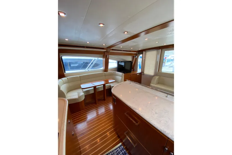 Slide: The Image of Luxurious interior of 2012 Tiara Yachts 4800 Convertible with elegant seating and modern design. - 7