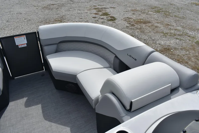 Slide: The Image of Luxurious seating on 2026 Lowe SS 230 DV pontoon boat, featuring sleek gray upholstery. - 23