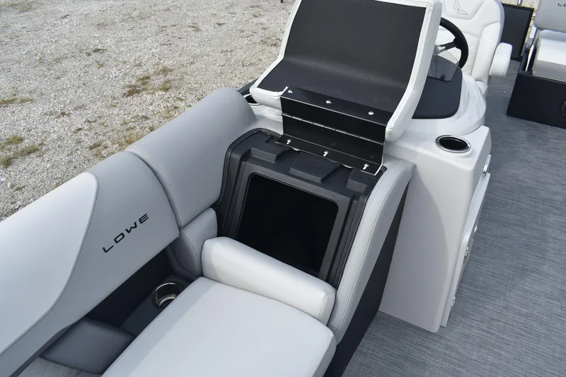 Slide: The Image of 2026 Lowe SS 230 DV boat interior with gray seating and storage compartment. - 25
