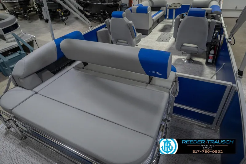 Slide: The Image of 2026 Bennington 23 SSB pontoon boat interior with gray and blue seating. - 14
