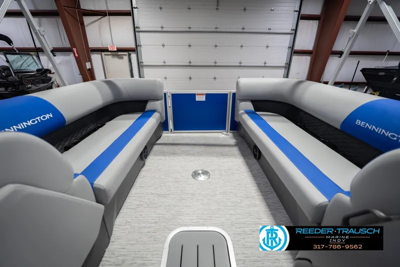 Slide: The Image of 2026 Bennington 23 SSB pontoon boat interior with gray and blue seating. - 22