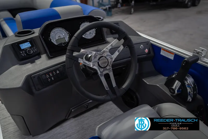 Slide: The Image of Steering console of 2026 Bennington 23 SSB boat with modern controls and gauges. - 31