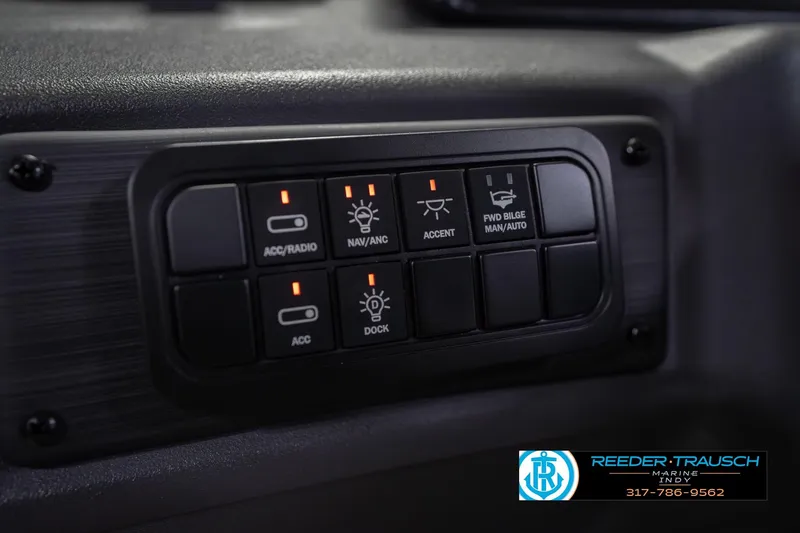 Slide: The Image of Control panel of 2026 Bennington 23 SSB boat with labeled switches. - 33