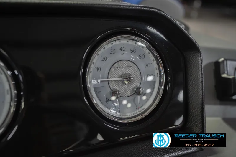 Slide: The Image of Close-up of 2026 Bennington 23 SSB speedometer, featuring Reeder-Trausch Marine logo. - 36