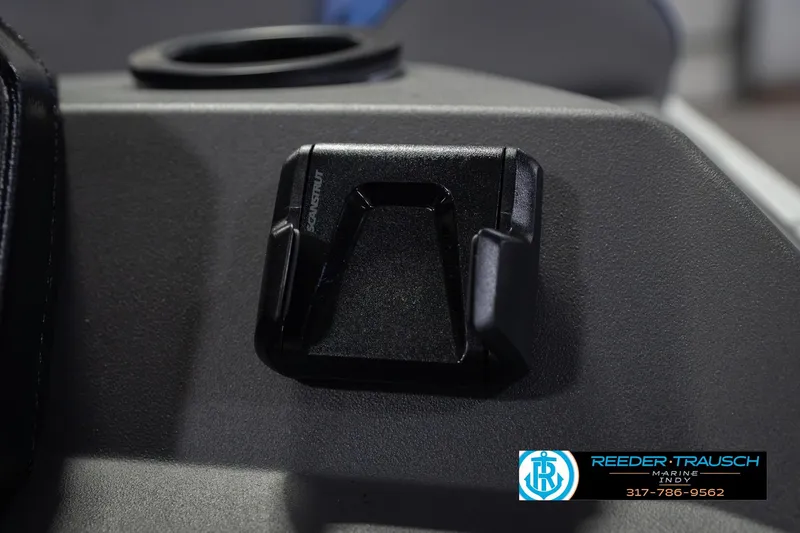 Slide: The Image of Close-up of 2026 Bennington 23 SSB boat interior with cup holder and accessory mount. - 37