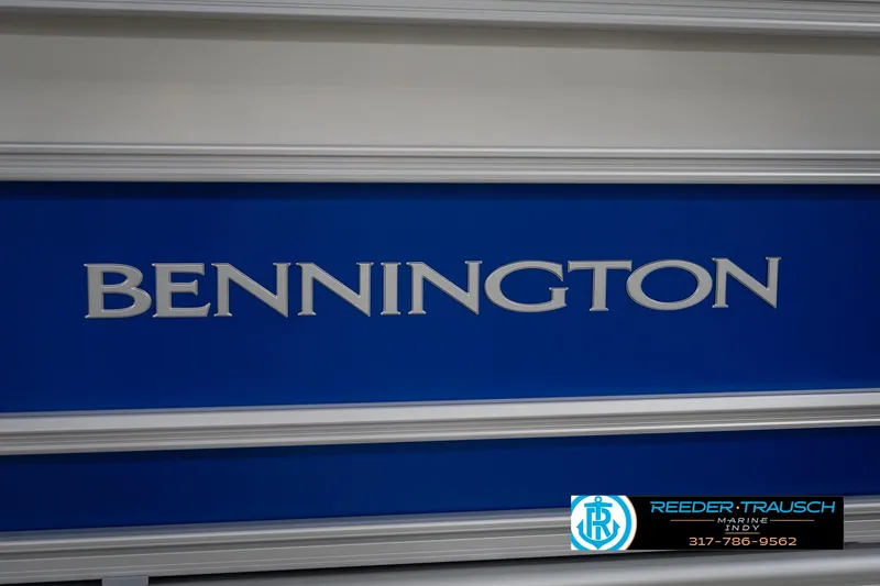 Slide: The Image of Bennington 23 SSB 2026 model, blue and white design, Reeder Trausch Marine logo. - 49