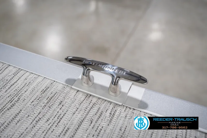 Slide: The Image of 2026 Bennington 23 SSB boat cleat on textured deck surface. - 54