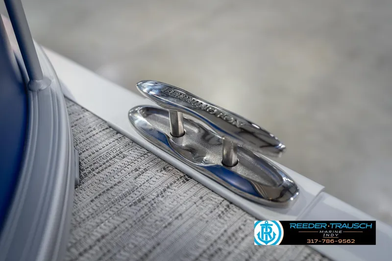 Slide: The Image of 2026 Bennington 23 SSB boat cleat detail with Reeder Trausch Marine logo. - 56