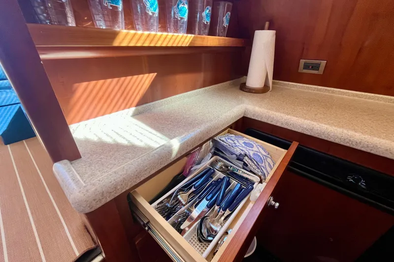 Slide: The Image of Built-in stovetop on 2006 Bertram 390 Convertible yacht, featuring dual burners and sleek design. - 20