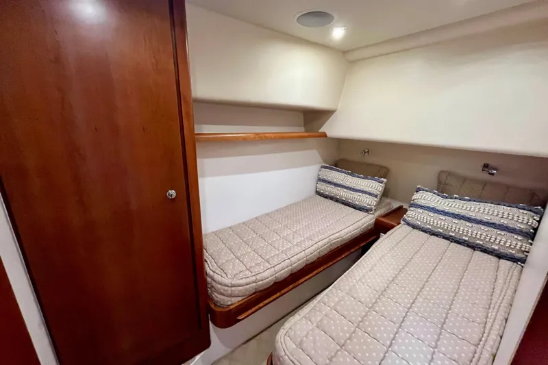 Slide: The Image of Entertainment system in 2006 Bertram 390 Convertible yacht with TV and audio controls. - 37