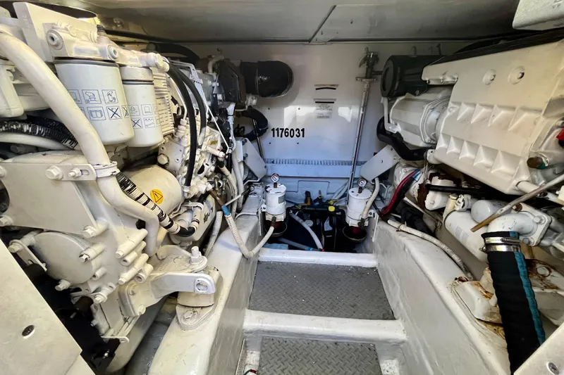 Slide: The Image of Engine compartment of a 2006 Bertram 390 Convertible with storage drawers. - 50