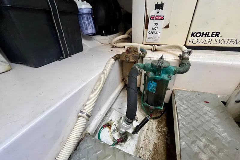 Slide: The Image of Engine room of 2006 Bertram 390 Convertible with Kohler power systems and pumps. - 55