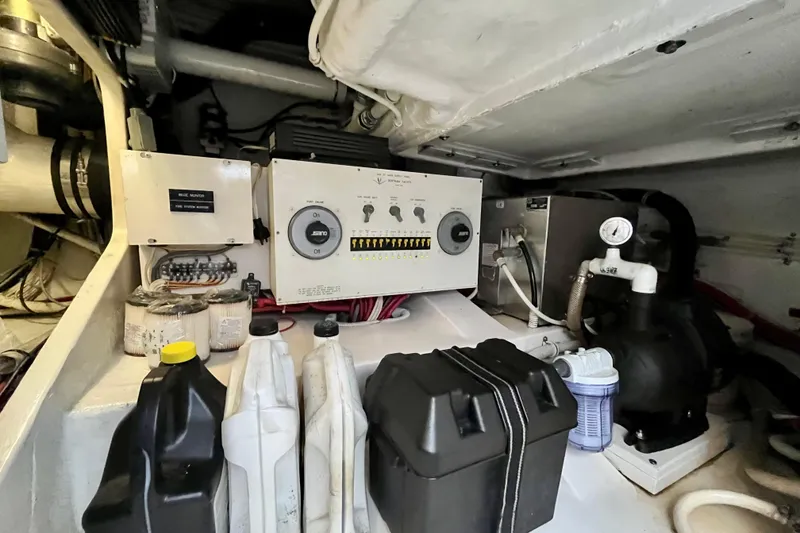 Slide: The Image of Engine room of a 2006 Bertram 390 Convertible with Kohler power system components. - 56