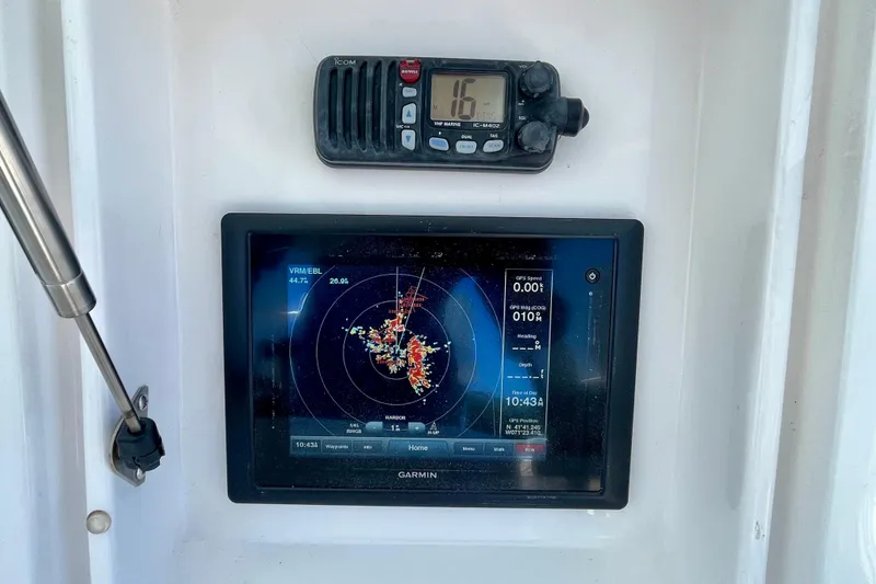 Slide: The Image of Boat radio and control panel on a 2006 Bertram 390 Convertible yacht. - 65