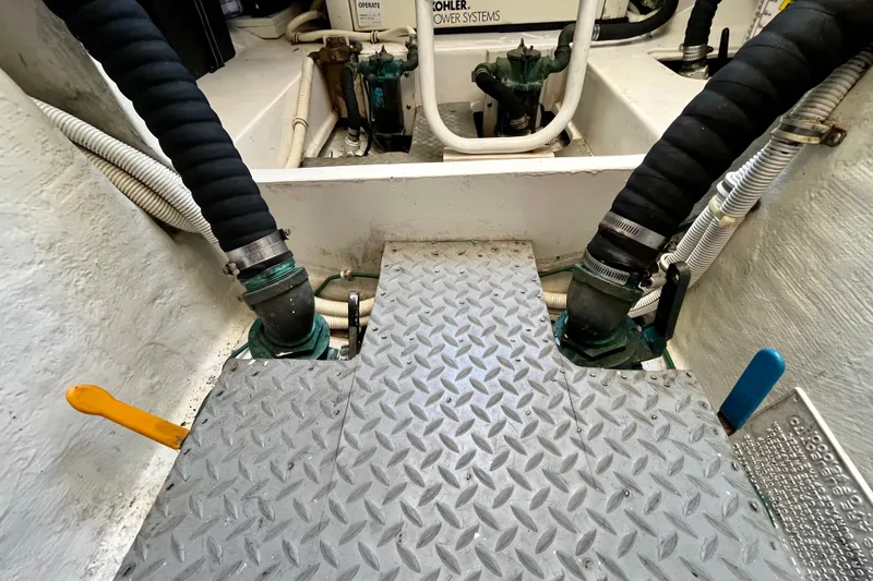 Slide: The Image of 24V DC system panel on 2006 Bertram 390 Convertible boat, showing voltage and current gauges. - 71