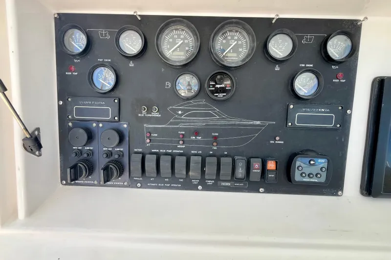 Slide: The Image of Engine room of 2006 Bertram 390 Convertible with hoses and diamond plate flooring. - 73