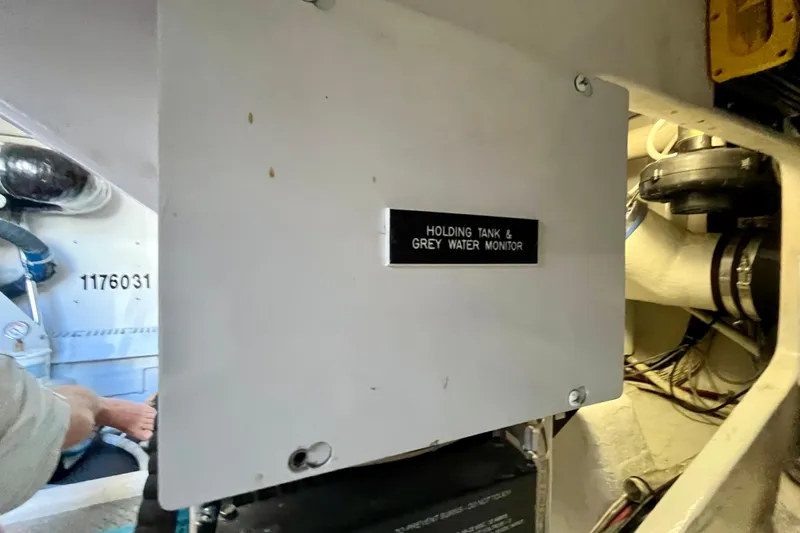 Slide: The Image of Control panel of a 2006 Bertram 390 Convertible boat with gauges and switches. - 75