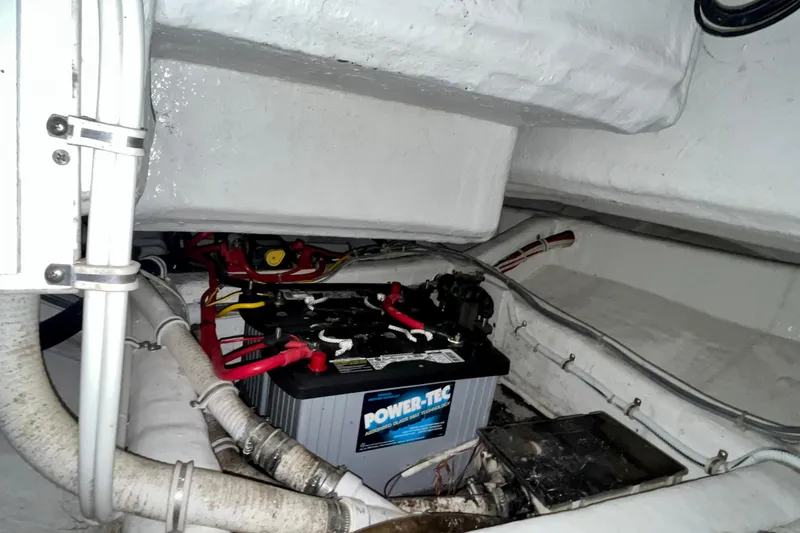 Slide: The Image of Battery compartment of a 2006 Bertram 390 Convertible boat, featuring Power-Tec battery. - 83