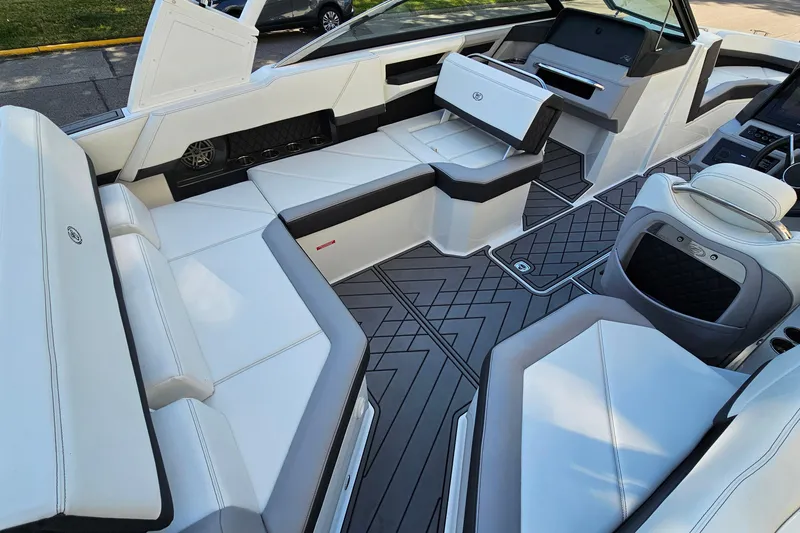 Slide: The Image of Luxurious interior of 2022 Cobalt R4 boat with white seating and modern design. - 12