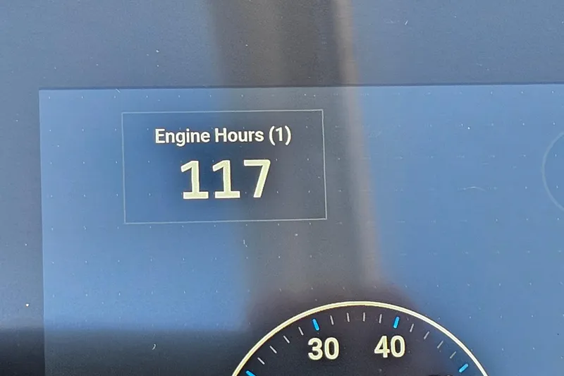 Slide: The Image of Dashboard display showing 117 engine hours on a 2022 Cobalt R4. - 28