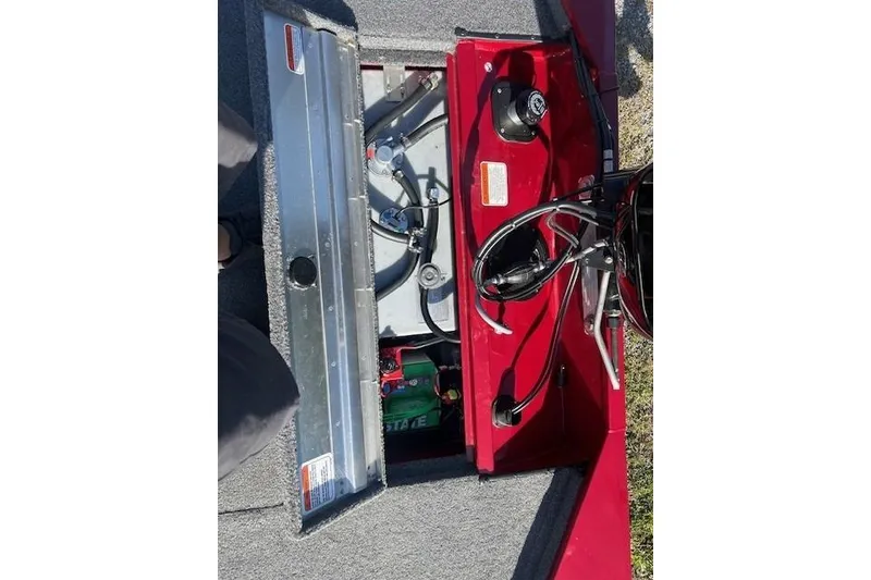 Slide: The Image of Interior view of 2025 Tracker Pro 170 boat showing battery and wiring components. - 8