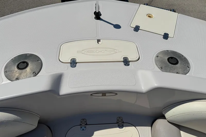 Slide: The Image of 2008 Tahoe 195 boat deck with storage compartments and seating. - 20