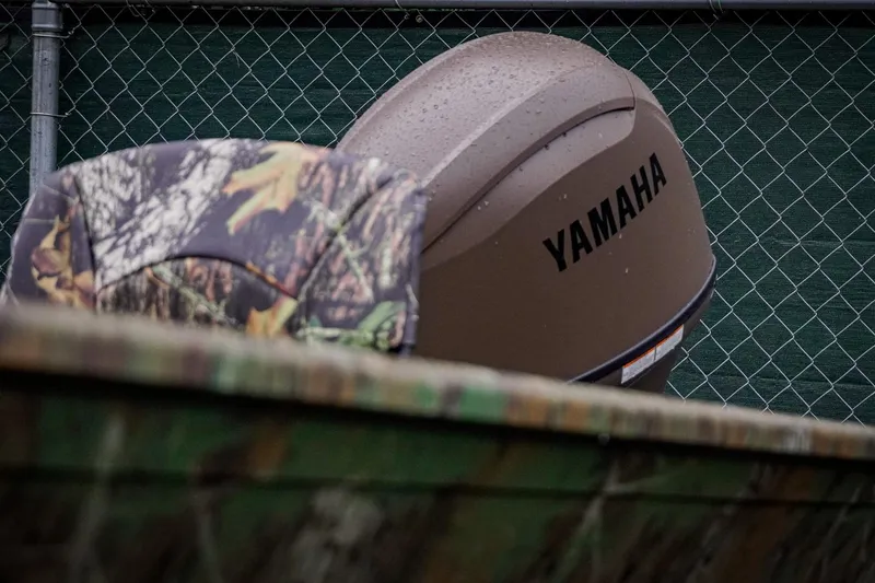 Slide: The Image of Camo boat seat and Yamaha motor on G3 17SC, 2026 model. - 10