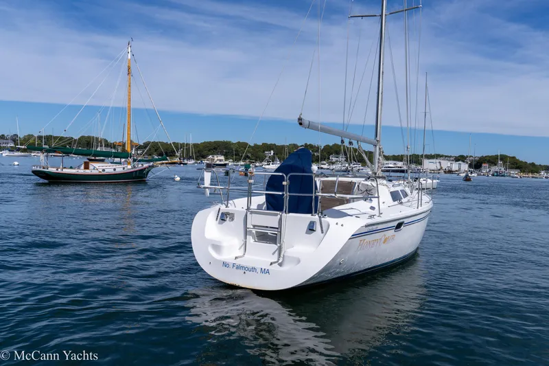 Slide: The Image of 2003 Catalina 320 sailboat anchored in a scenic harbor, Falmouth, MA. - 7