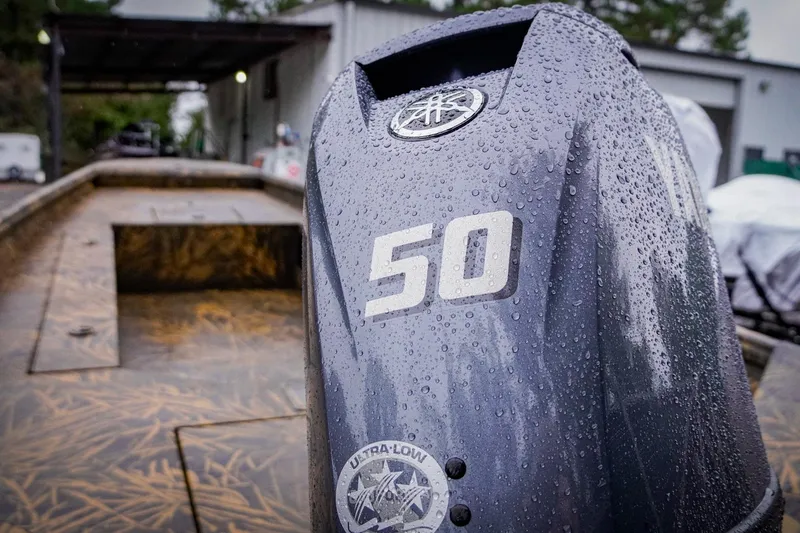 Slide: The Image of 2026 G3 17DK boat with Yamaha 50 engine, wet with raindrops. - 5