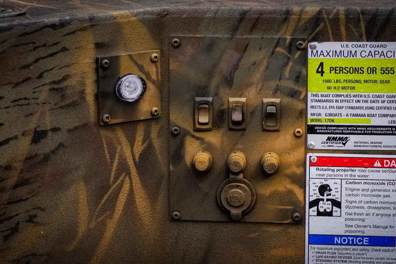 Slide: The Image of Control panel of G3 17DK boat, 2026 model, with capacity and safety labels. - 8