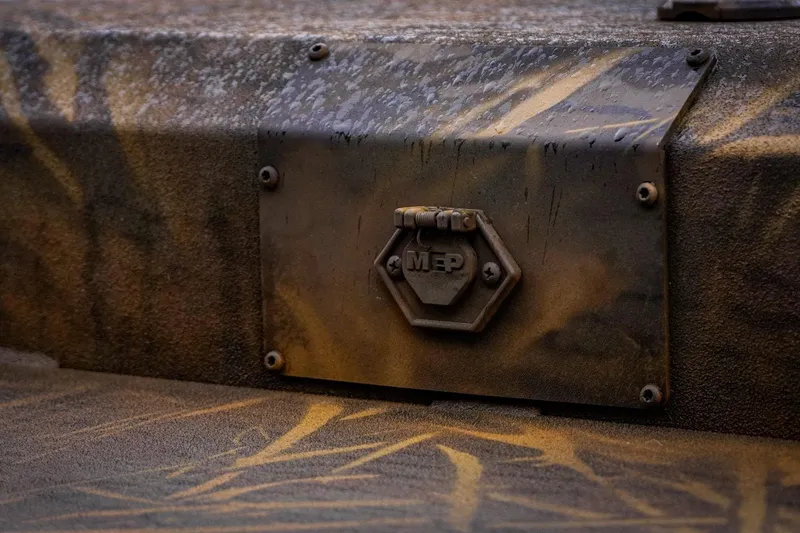 Slide: The Image of Close-up of a rugged metal panel on a 2026 G3 17DK boat. - 9